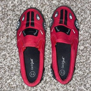 Boys size 11 red car shoes.